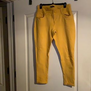 Yellow tights with buttons and belt loops